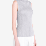 Grey shirt worn by a person, showing the shirt fit