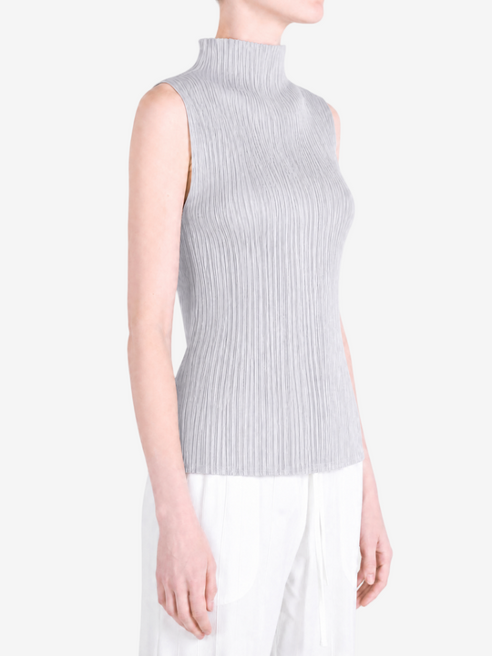Grey shirt worn by a person, showing the shirt fit
