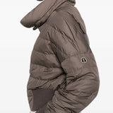 Close up of brown jackets, showing texture of the recycled taffeta fabric