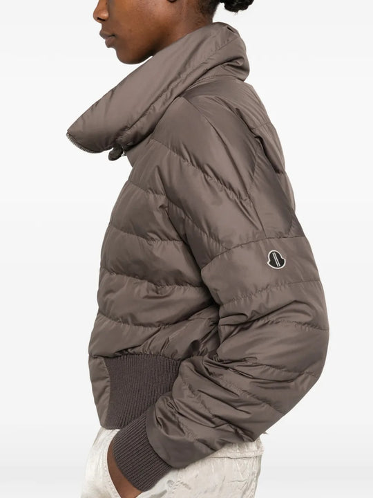 Close up of brown jackets, showing texture of the recycled taffeta fabric