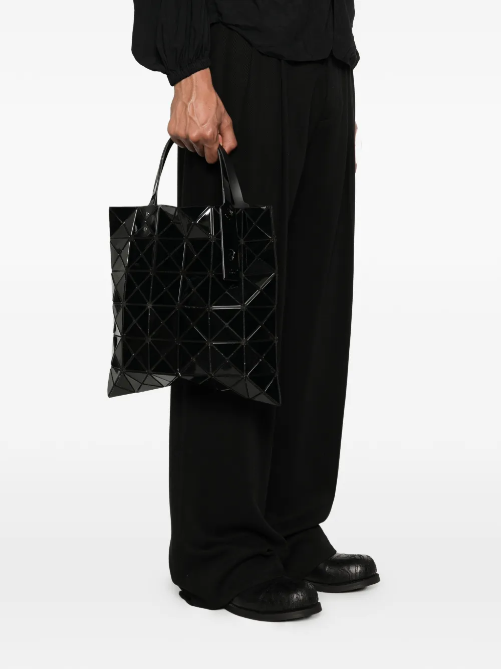 Black bag worn by a person, showing the bag fit
