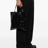 Black bag worn by a person, showing the bag fit