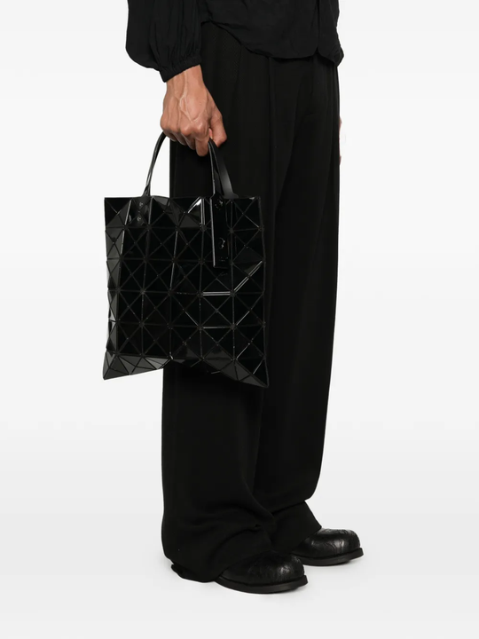 Black bag worn by a person, showing the bag fit