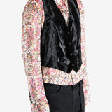 Black top worn by a person, showing the top's fit