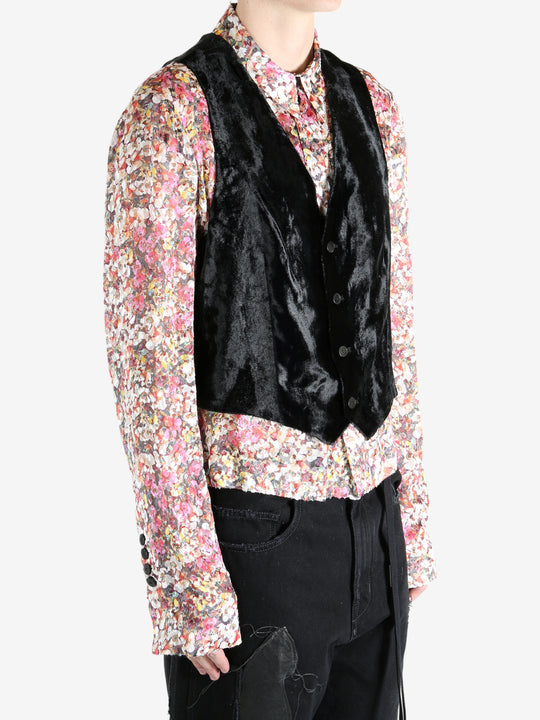 Black top worn by a person, showing the top's fit