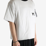 White t-shirt worn by a person, showing the shirt's fit