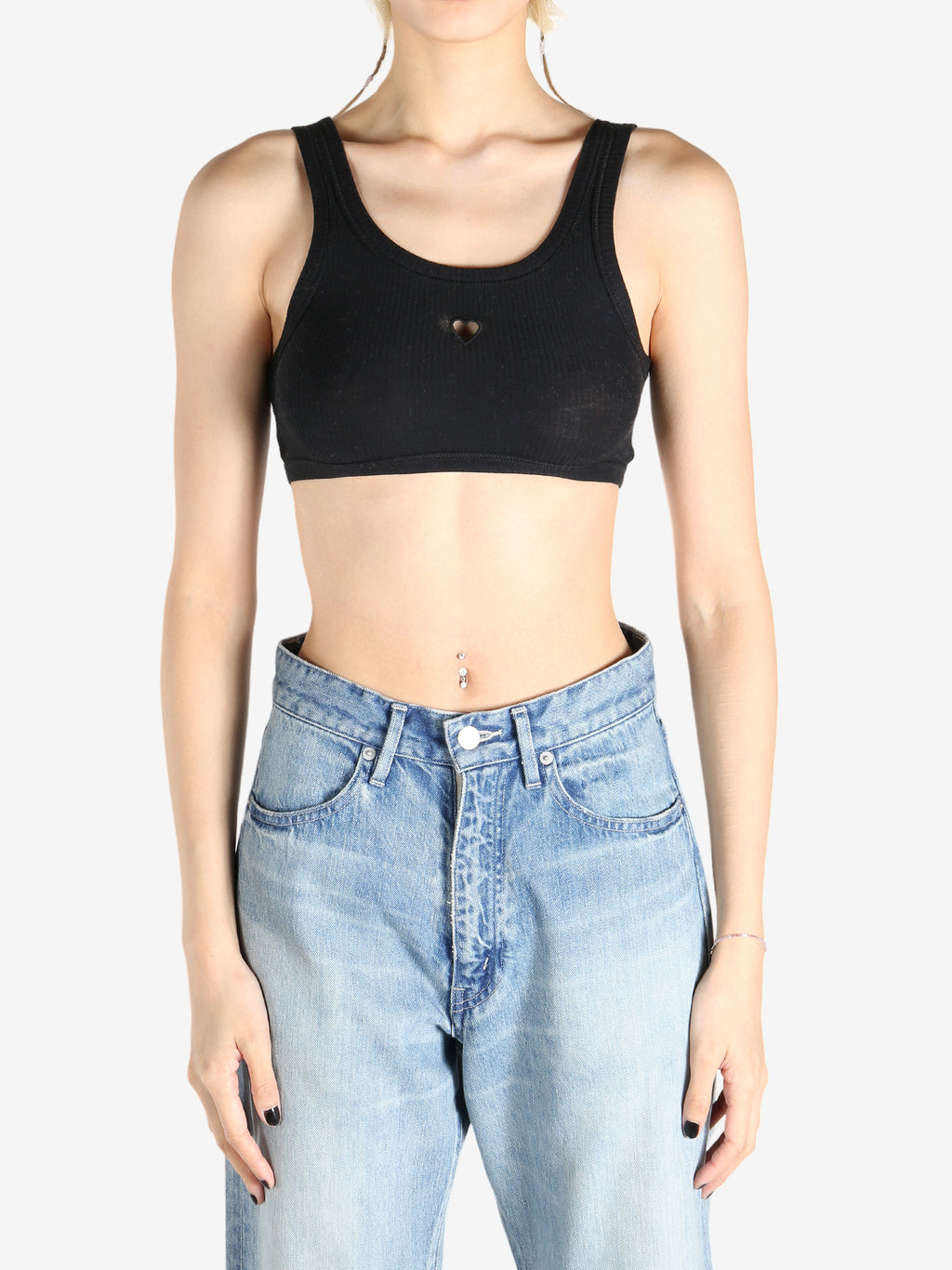 Black bra worn by a person, showing the bra fit