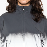 Close up of grey  jacket, showing texture of the Polyester fabric