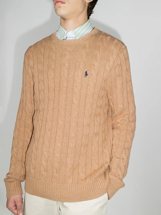 Orange sweater worn by a person, showing the sweater fit