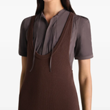 Close up of brown dresses, showing texture of the viscose fabric