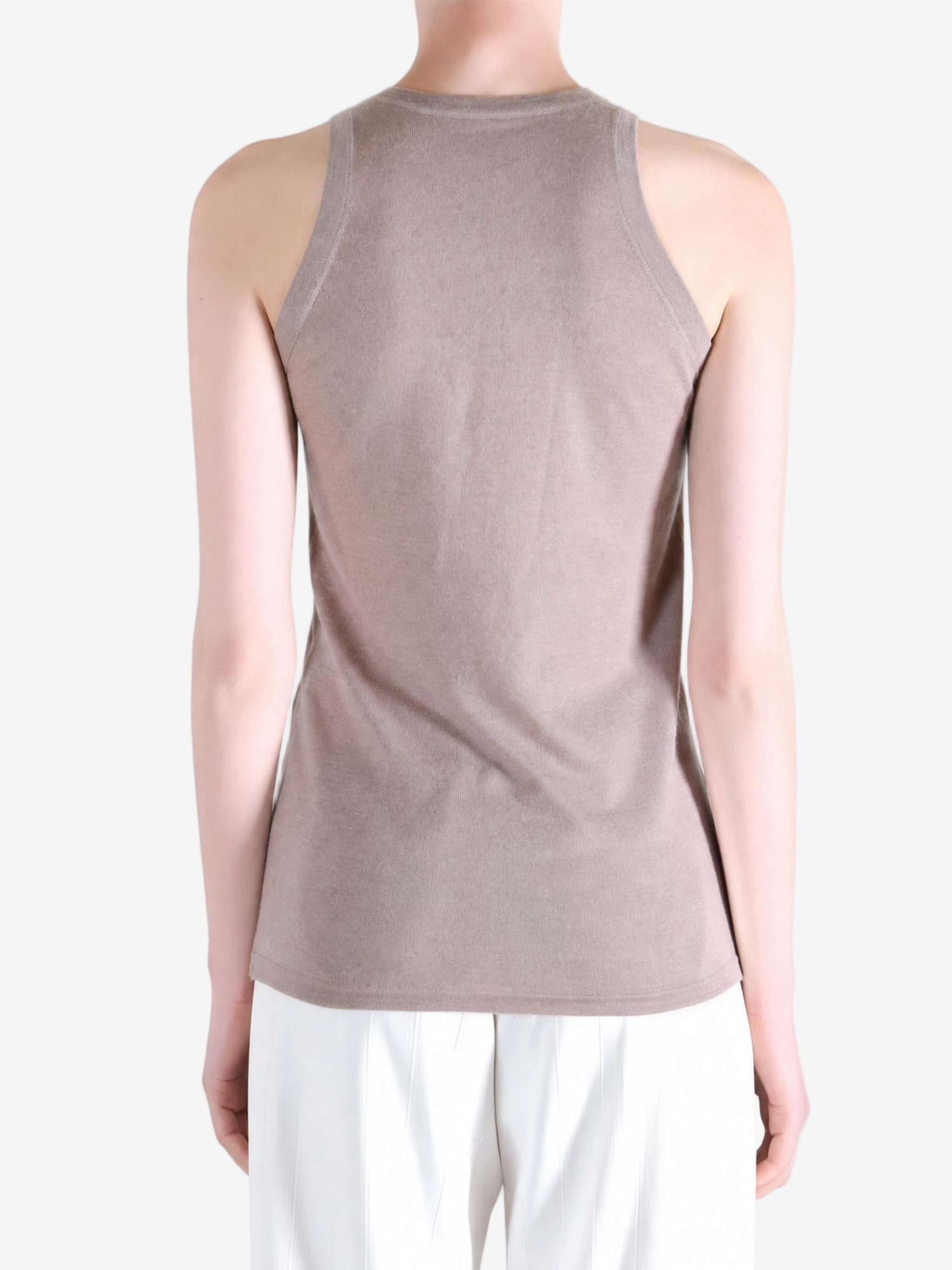 Tan top worn by a person, showing the top fit