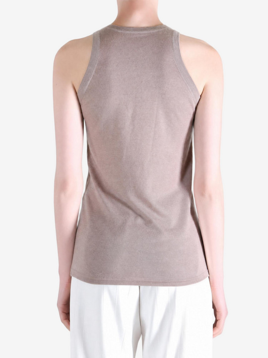 Tan top worn by a person, showing the top fit