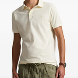 Tan shirt worn by a person, showing the shirt fit