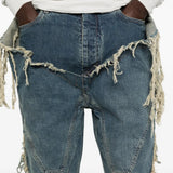 Close up of blue pants, showing texture of the fabric