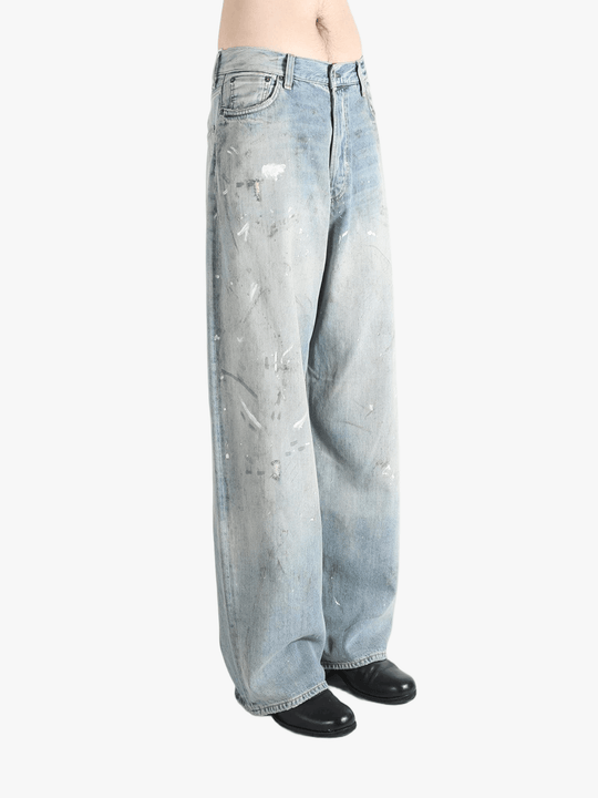 Blue jeans worn by a person, showing the jeans's fit