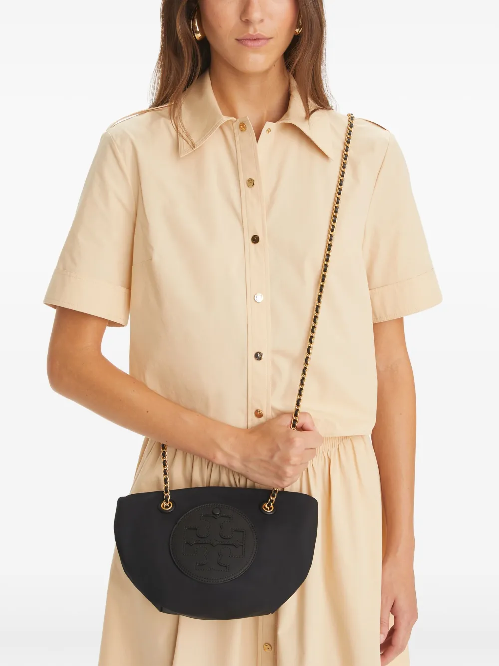 Black bag worn by a person, showing the bag's fit