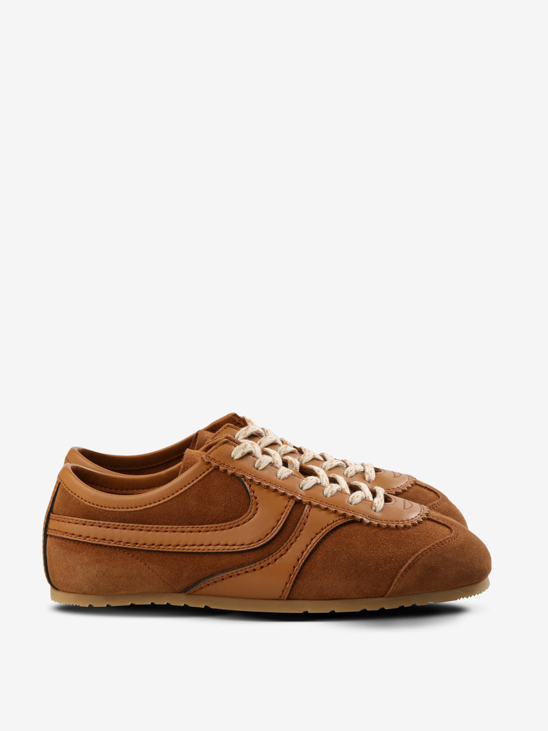 Tan sneakers, front view