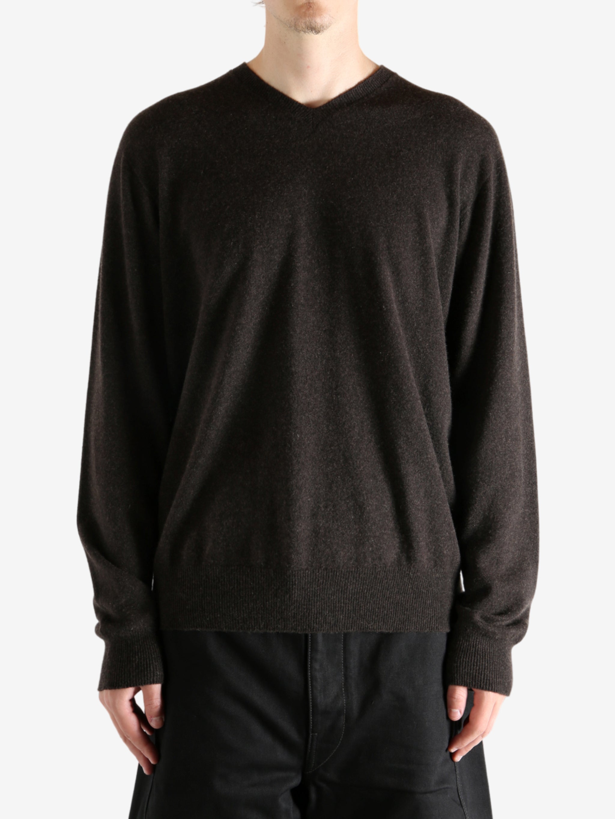 Brown sweater worn by a person, showing the sweater&#39;s fit