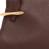 Brown leather handbag with Givenchy logo on a white background