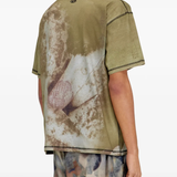 green t-shirts worn by a person, showing the tops fit