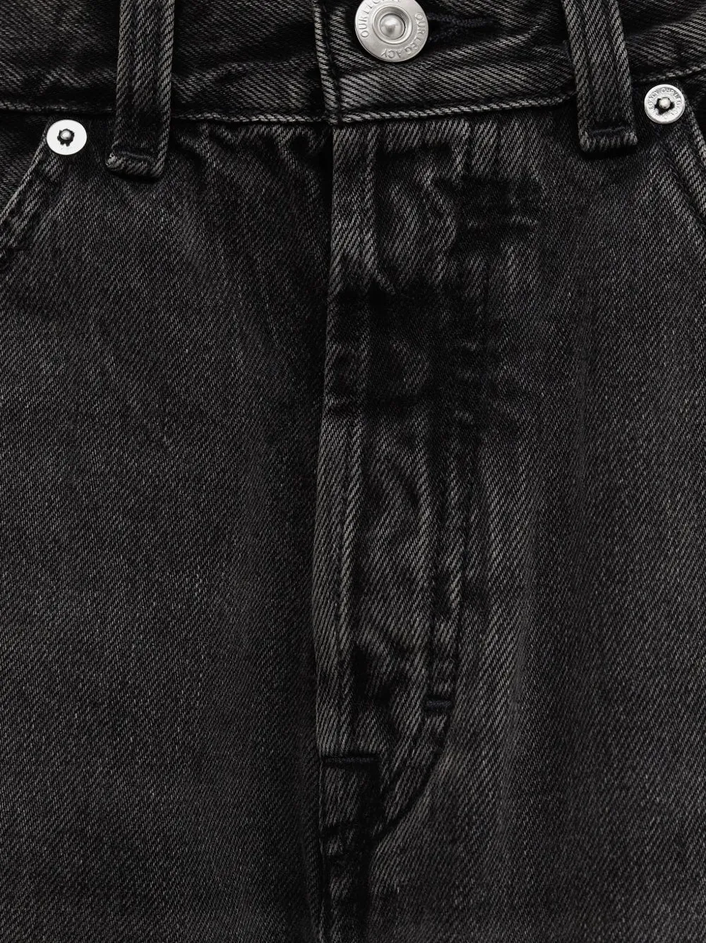 Close up of grey pants, showing texture of the Cotton fabric