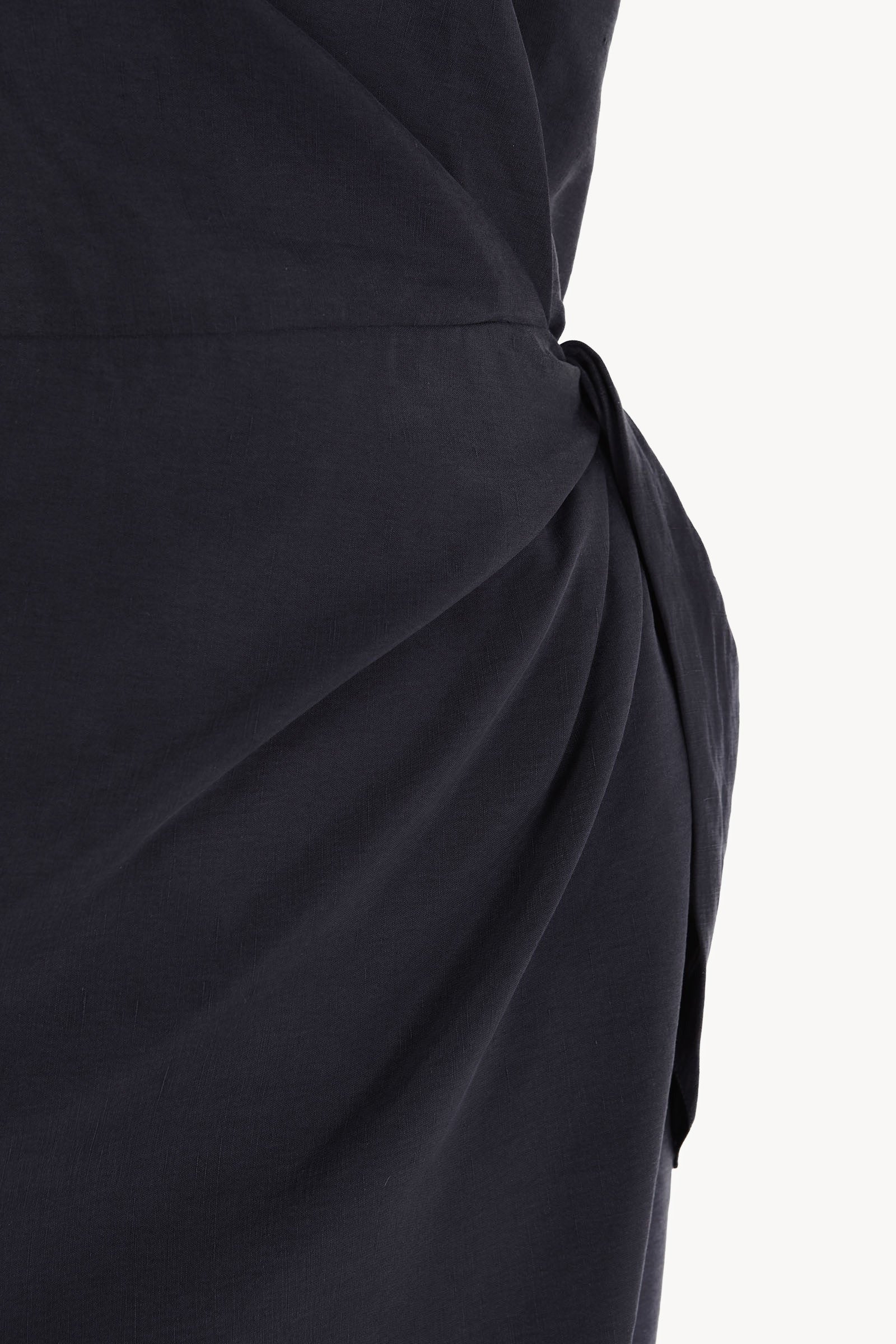 Close up of Navy dress, showing texture of the 52% linen/ 48% silk fabric