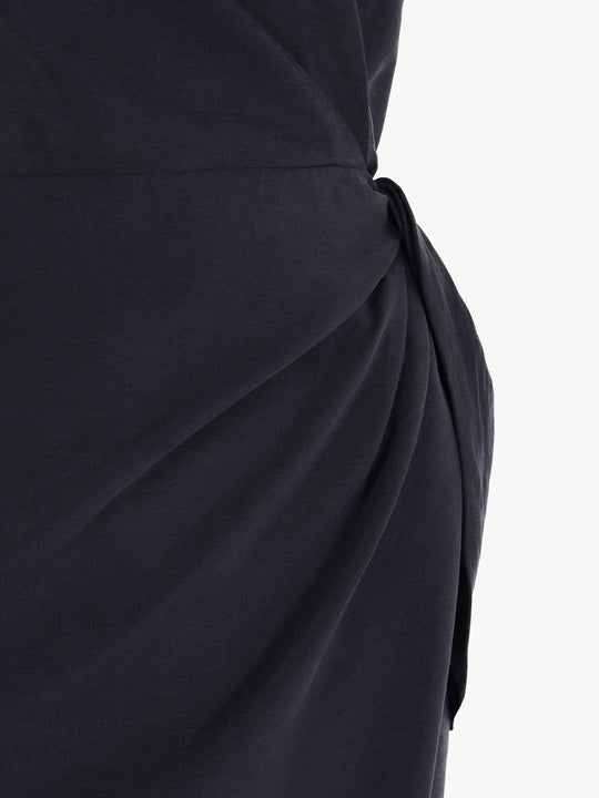 Close up of Navy dress, showing texture of the 52% linen/ 48% silk fabric