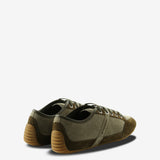 Green sneakers,back view