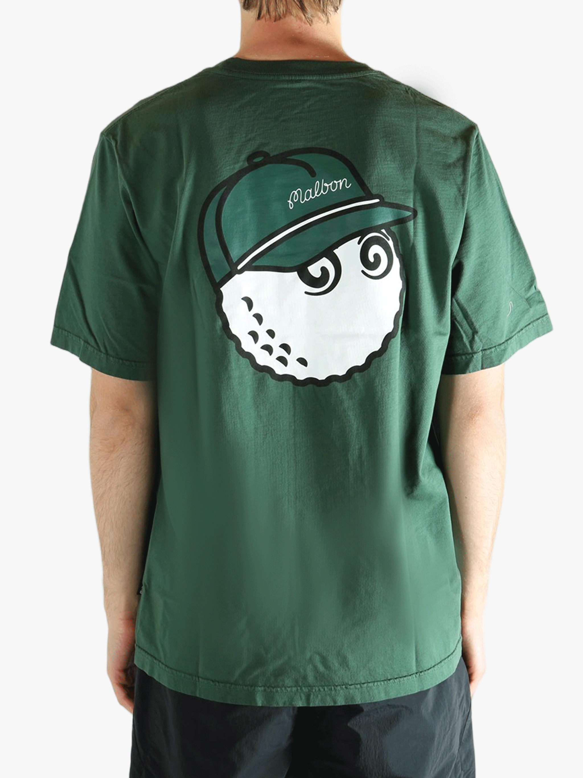 Green t-shirt worn by a person, showing the t-shirt fit