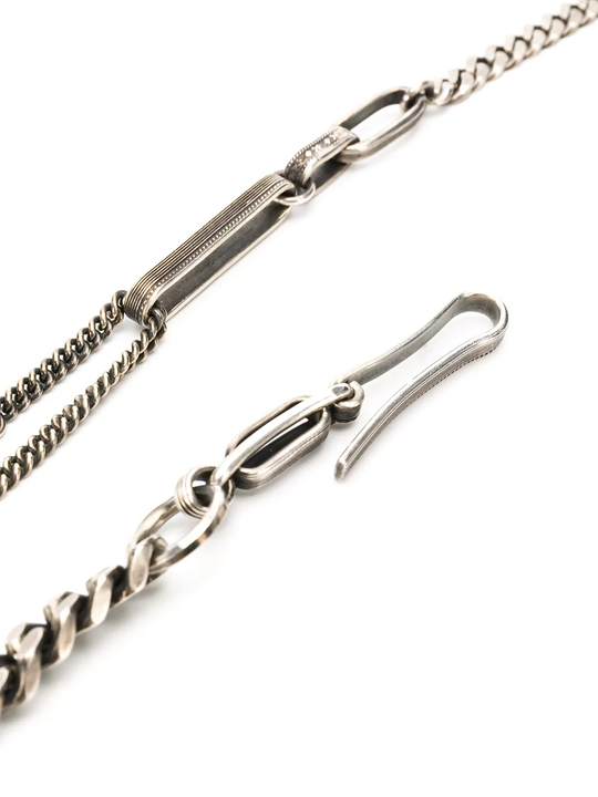 Close up of silver necklace