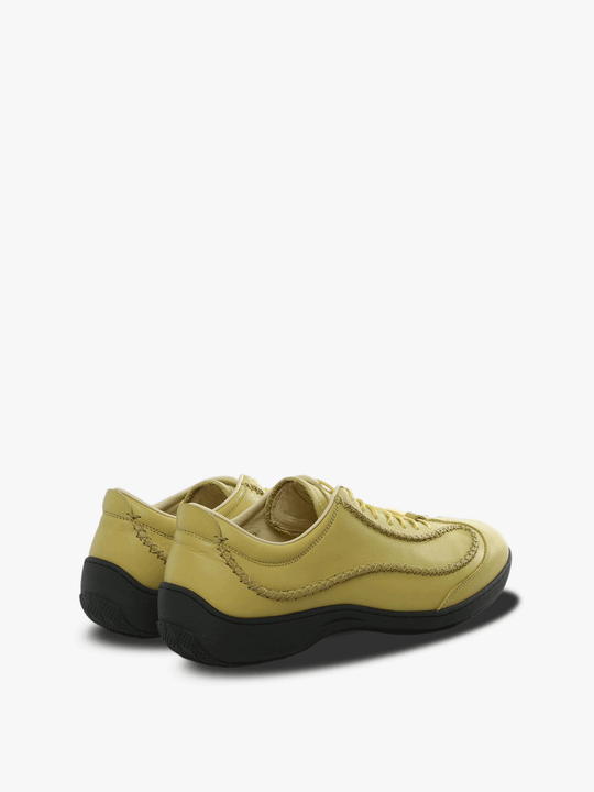 Yellow sneakers, side view