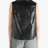 Black top worn by a person, showing the top's fit