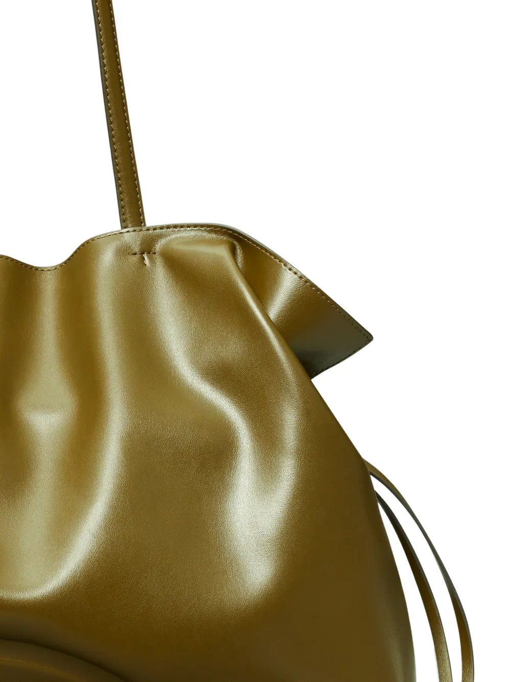 Gold metallic handbag with drawstring on a white background
