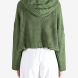 Green knitwear, front view