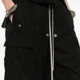 Close up of black pants, showing texture of the organic cotton fabric