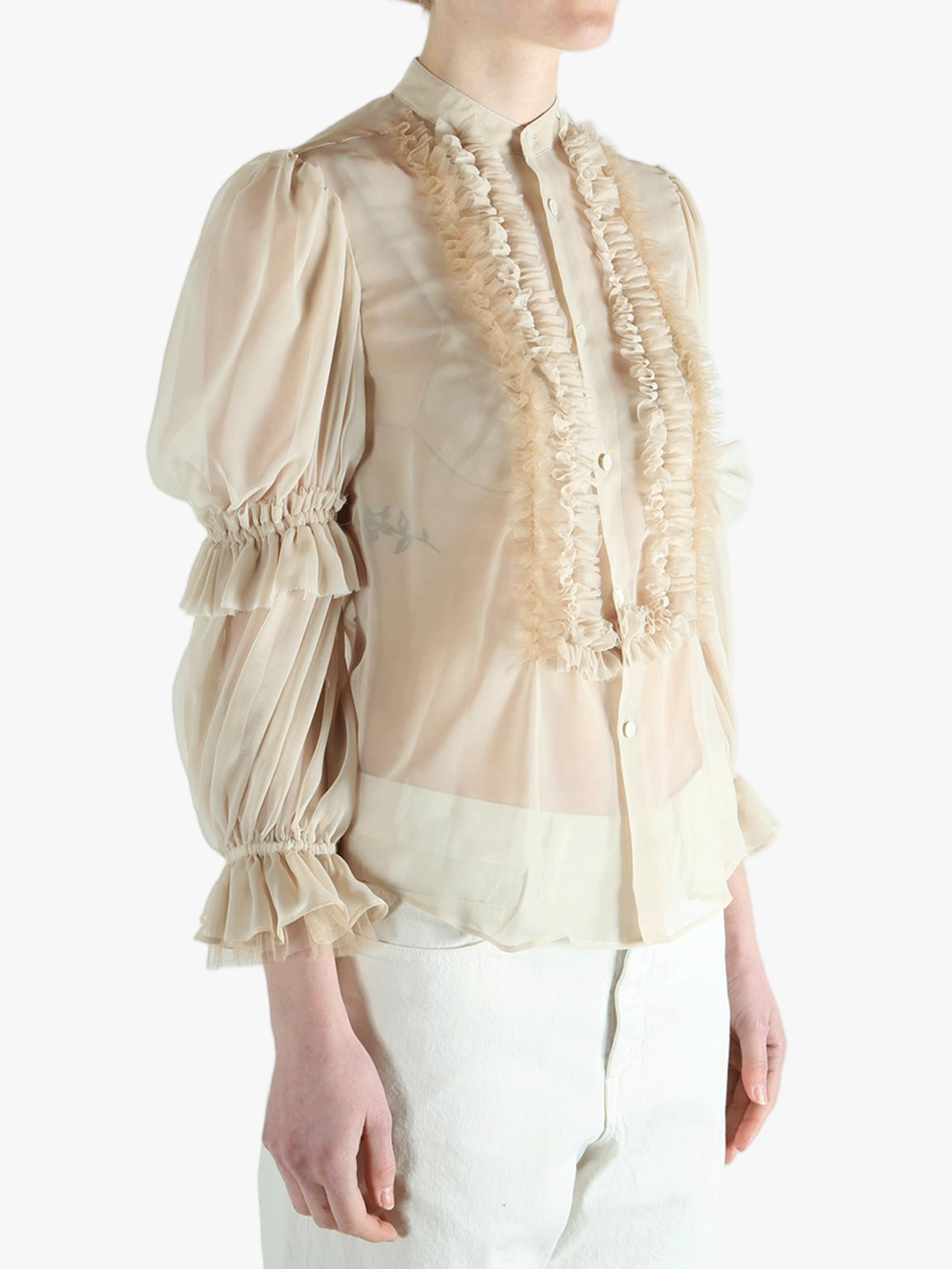 Tan t-shirt worn by a person, showing the t-shirt's fit