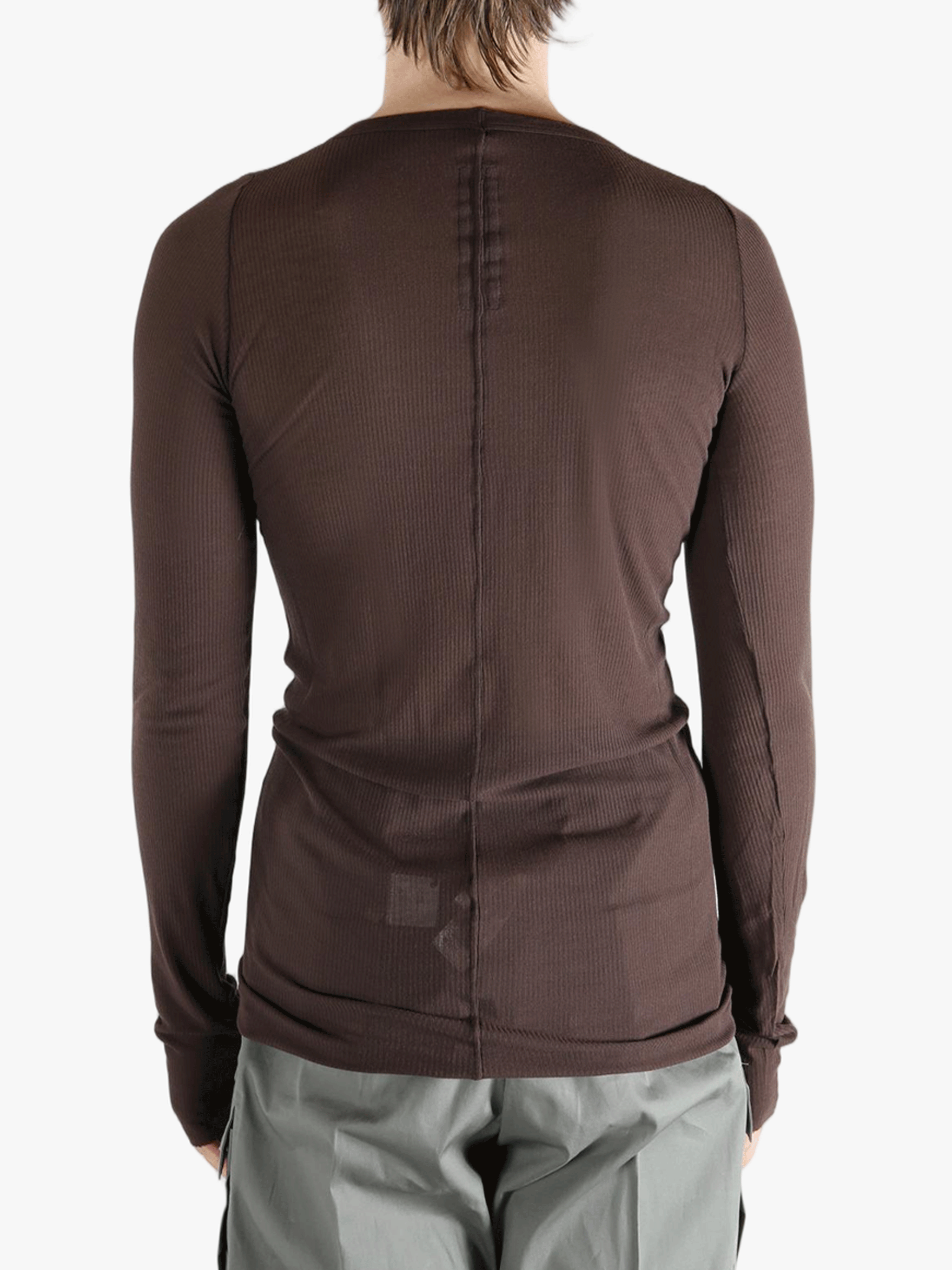 Brown t-shirt worn by a person, showing the shirt's fit