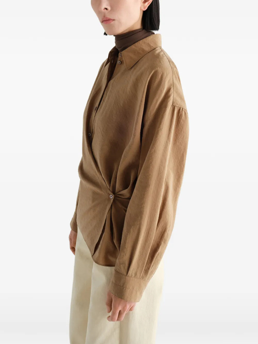 Tan dress worn by a person, showing the dress fit