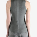 Grey tops worn by a person, showing the tops fit