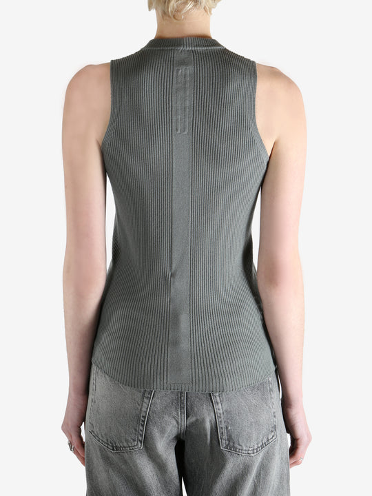 Grey tops worn by a person, showing the tops fit