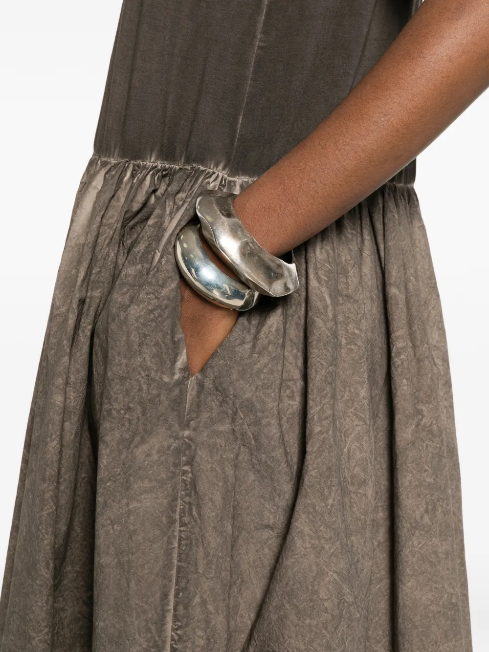 Close up of grey dress,showing texture of the cotton fabric