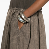 Close up of grey dress,showing texture of the cotton fabric