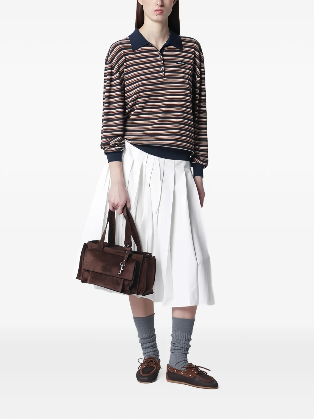 Brown bags worn by a person, showing the bags's fit