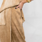 Close up of Tan skirts, showing texture of the viscose and spandex fabric