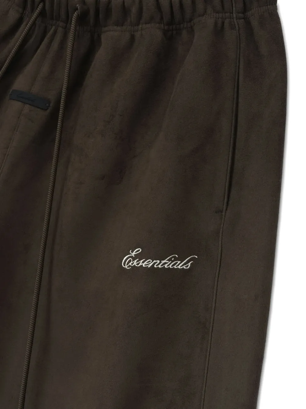 Close up of brown shorts,showing texture of the polyester fabric