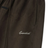 Close up of brown shorts,showing texture of the polyester fabric