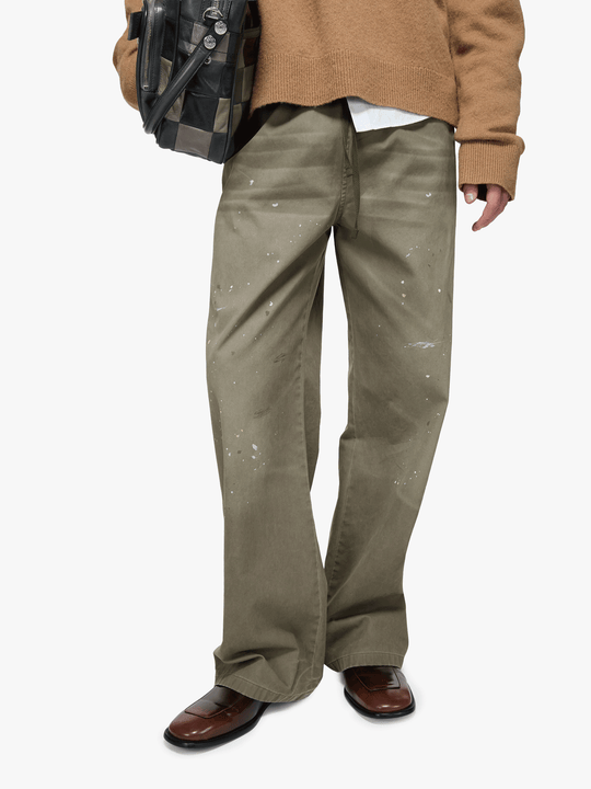 Green jeans, full body view