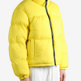 Yellow jacket worn by a person, showing the jacket fit