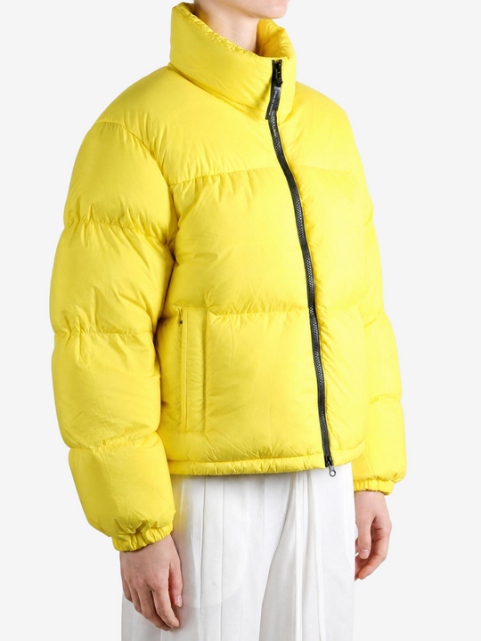 Yellow jacket worn by a person, showing the jacket fit