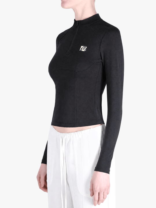 Black hoodie worn by a person, showing the hoodie fit